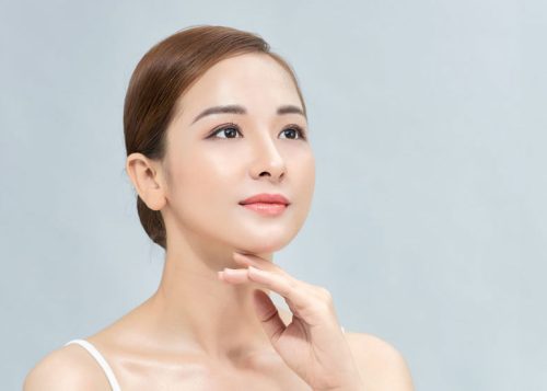 beautiful-asian-woman-with-perfect-makeup-smooth-skin-isolated-color-background-facial-beauty-plastic-surgery-concept-72TR-1